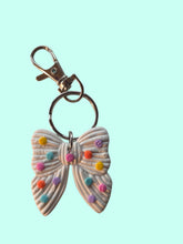 Load image into Gallery viewer, Confetti Bow Bag Swag
